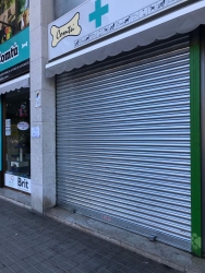 Porta enrotllable comerç
