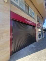 Porta enrotllable comerç
